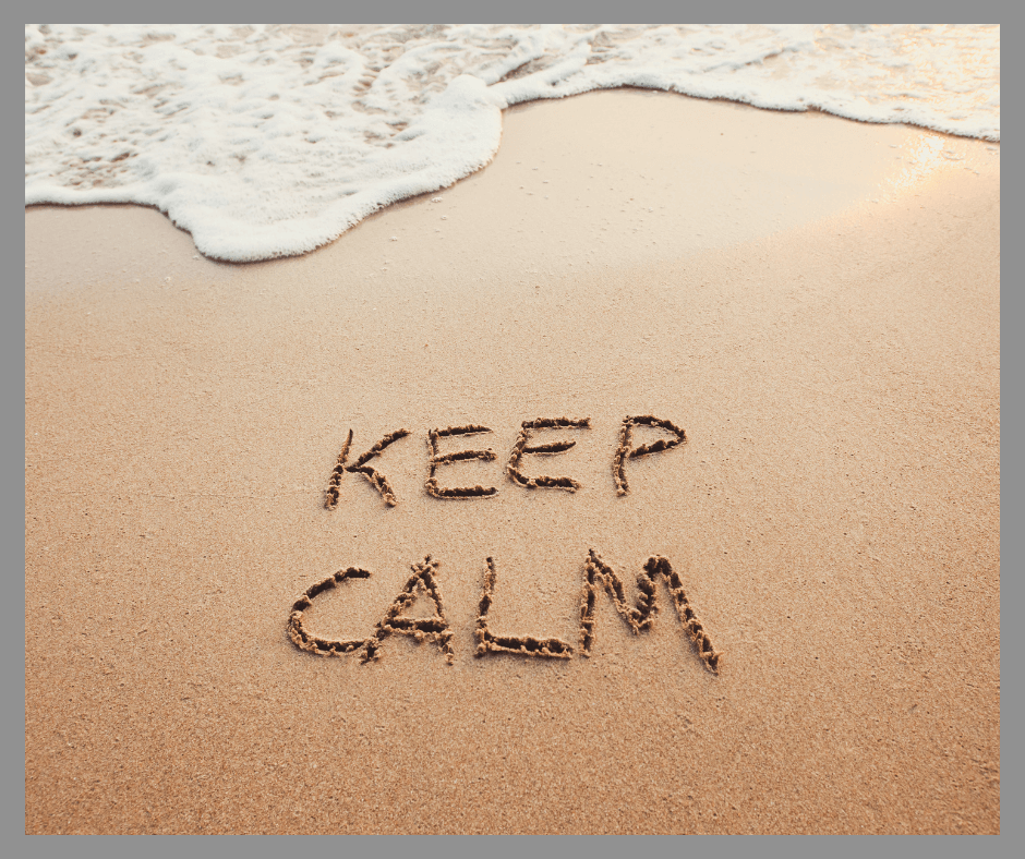 Keep Calm written in the sand