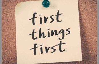 First things first written on a post it note