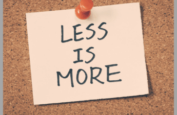 Less is More written on a post it note