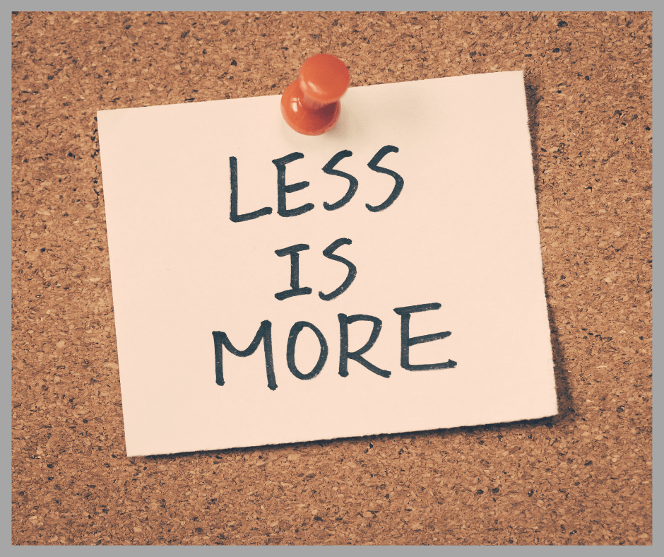 Less is More written on a post it note