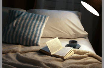 A book laying on a bed