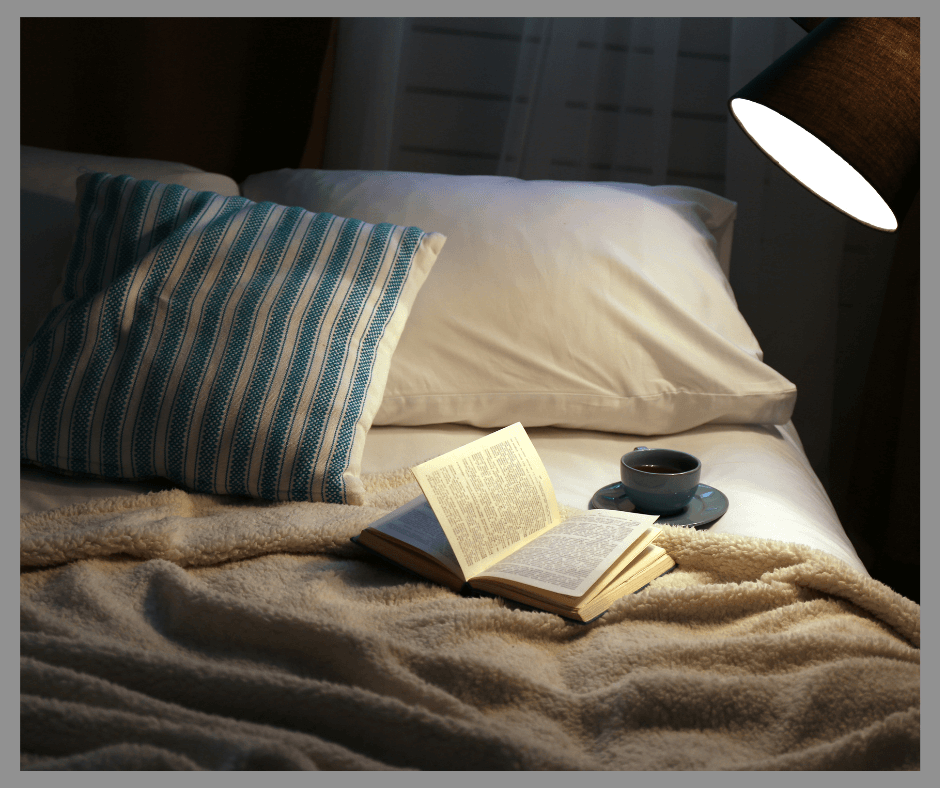 A book laying on a bed