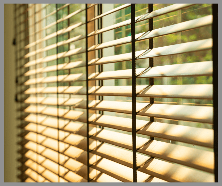 Venetian Blinds hanging at a window