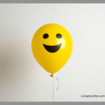 A yellow balloon with a happy face on it.
