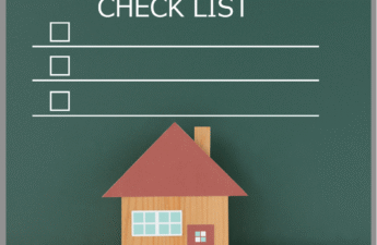 A checklist on a green background with a house on it.