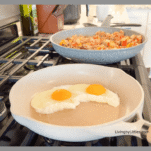 eggs in a ceramic skillet on the stove